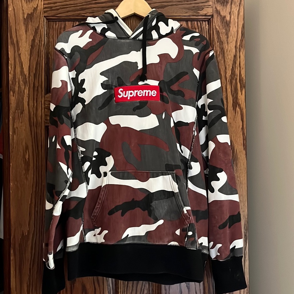 Gently used white black camo hoodie. Size medium.